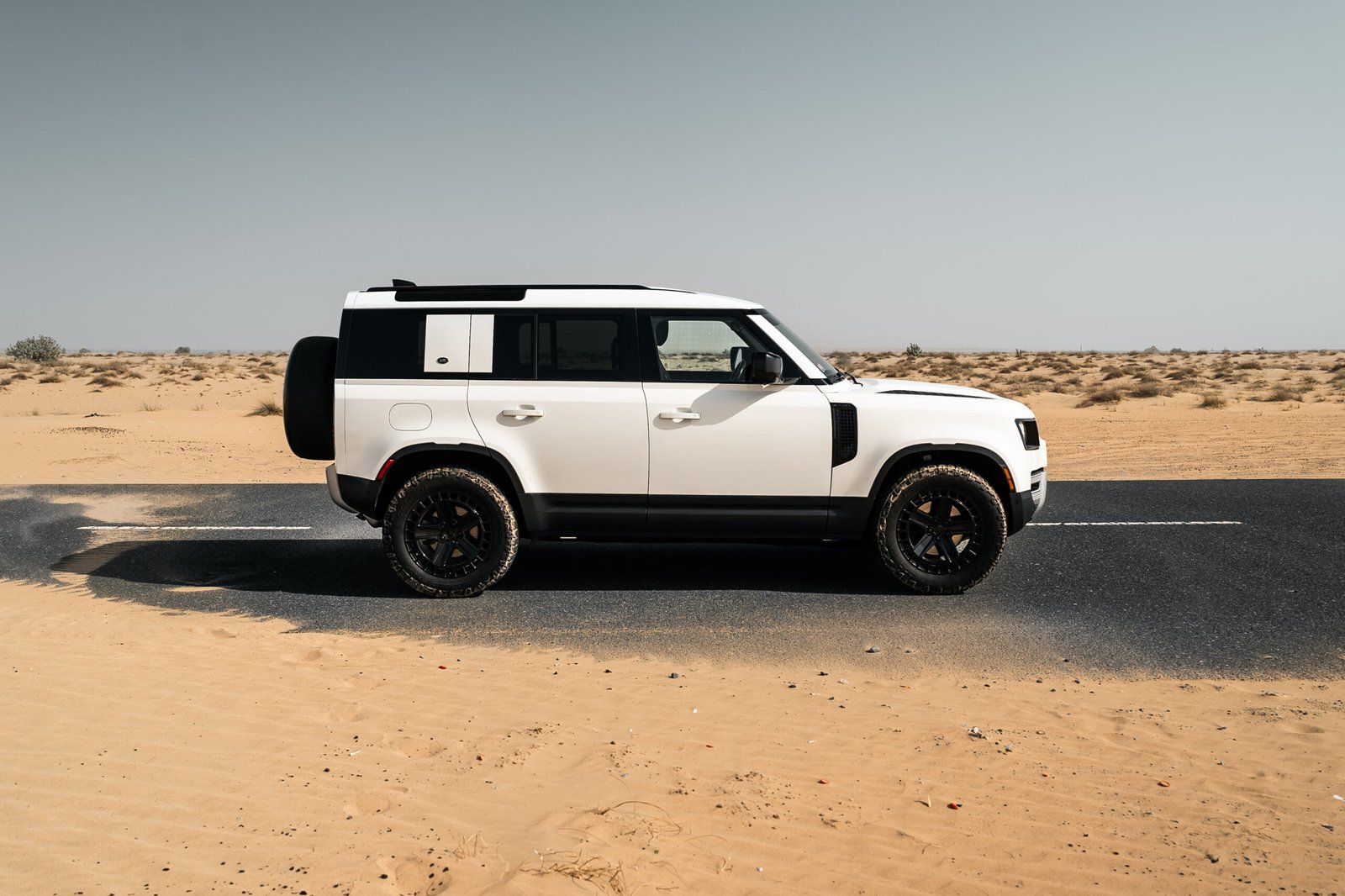 Land Rover Defender for rent in Dubai – rugged luxury SUV from Yaga Rent a Car
